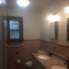 Double sinks, medicine cabinets and linen closet in main bath Double sinks, medicine cabinets and linen closet in main bath
