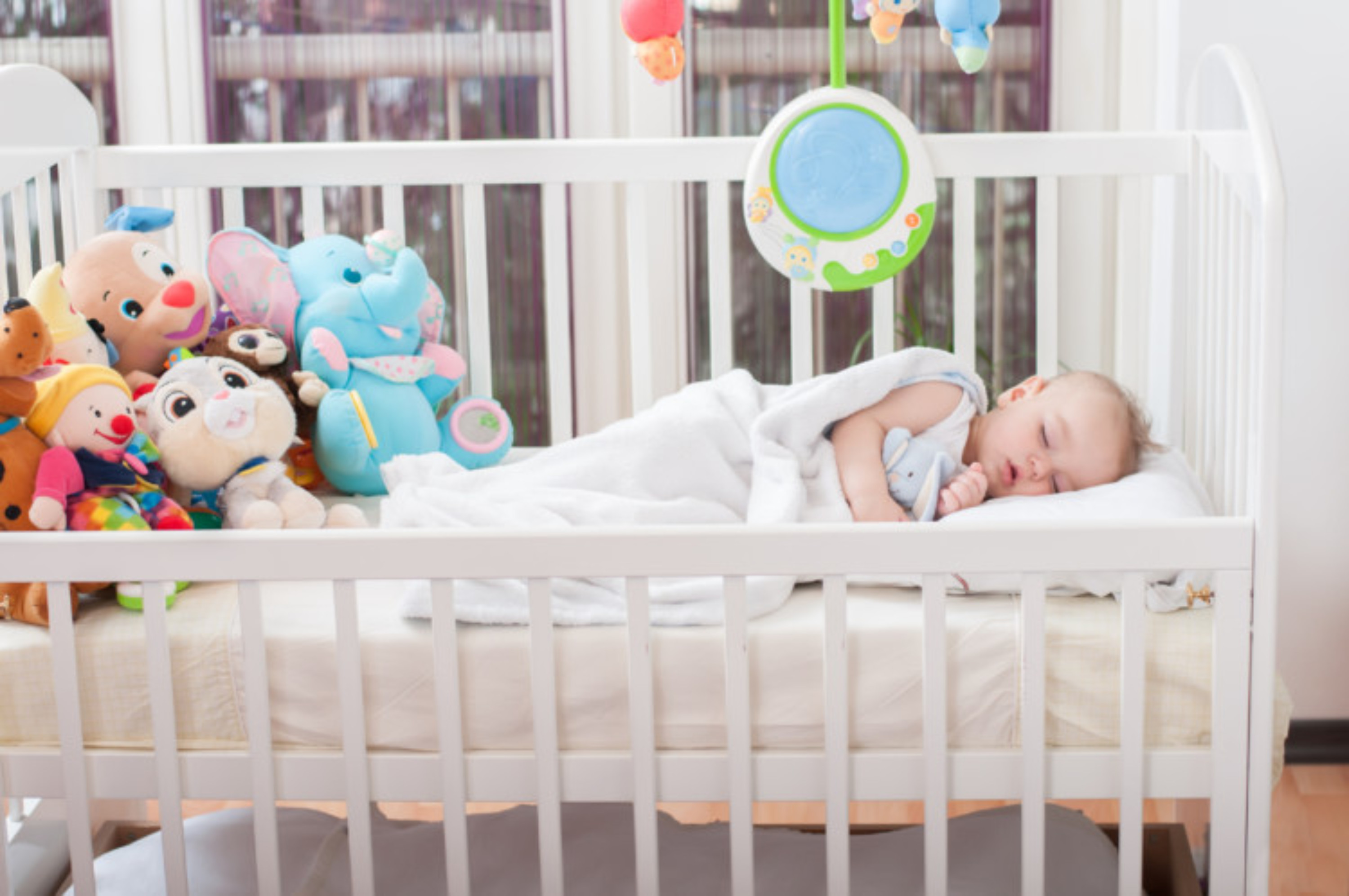 safe size for baby mattress for mini crib