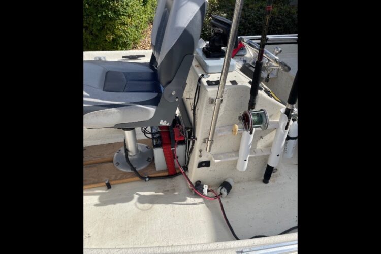 Trolling motor battery (solar charger) and grab rail over center console